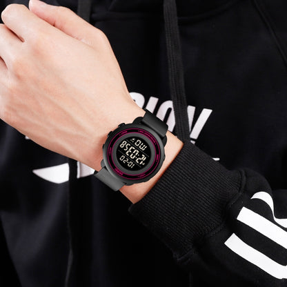 SKMEI 1736 Montre électronique lumineuse avec affichage numérique LED, cadran rond et triple heure.