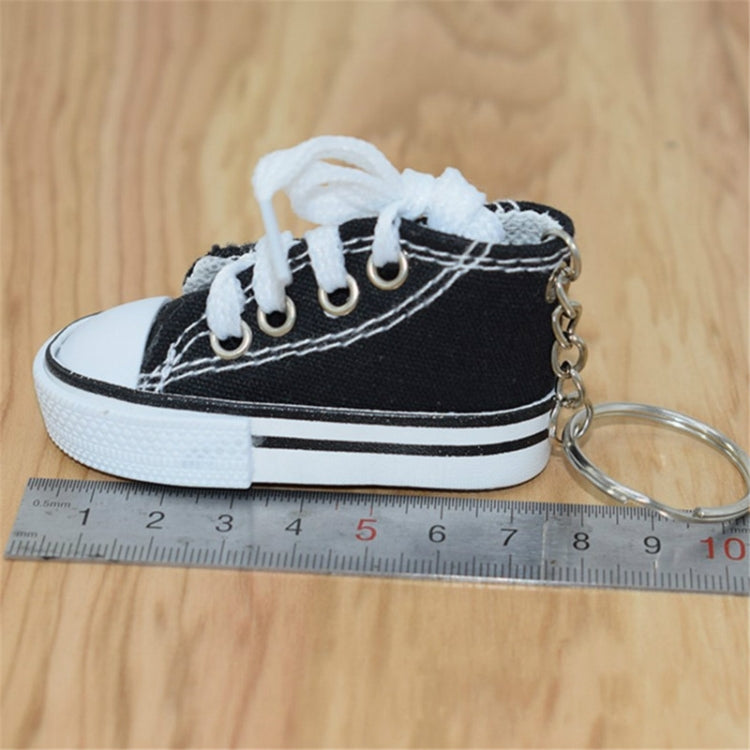 2 mini porte-clés pendentifs en toile de chaussures de simulation